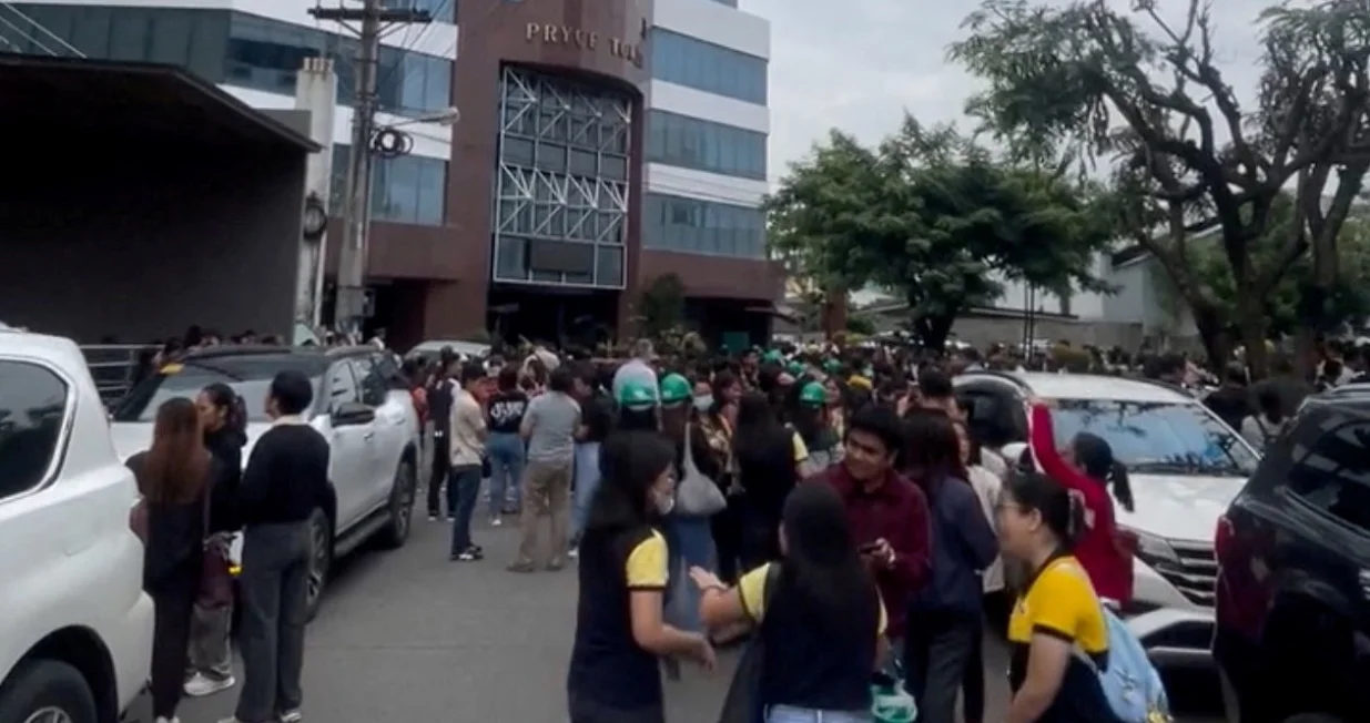 People gather in an open area following an earthquake of magnitude 7.5 that struck offshore in the southern Philippines, in Davao City, Mindanao, Philippines, October 10, 2025, in this screengrab obtained from a social media video. Francis Magbanua/via REUTERS THIS IMAGE HAS BEEN SUPPLIED BY A THIRD PARTY. MANDATORY CREDIT. NO RESALES. NO ARCHIVES. Verification:
Reuters was able to verify the location from building characteristics and business signage that matched file images.
Date of the video was confirmed by official statements./Francis Magbanua