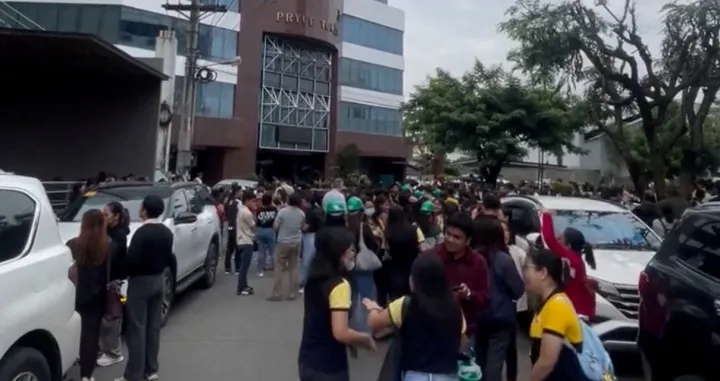 People gather in an open area following an earthquake of magnitude 7.5 that struck offshore in the southern Philippines, in Davao City, Mindanao, Philippines, October 10, 2025, in this screengrab obtained from a social media video. Francis Magbanua/via REUTERS THIS IMAGE HAS BEEN SUPPLIED BY A THIRD PARTY. MANDATORY CREDIT. NO RESALES. NO ARCHIVES. Verification:
Reuters was able to verify the location from building characteristics and business signage that matched file images.
Date of the video was confirmed by official statements./Francis Magbanua