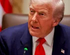 U.S. President Donald Trump listens to a reporter's question before his lunch with Argentina's President Javier Milei in the Cabinet Room at the White House in Washington, D.C., U.S., October 14, 2025. REUTERS/Jonathan Ernst/Jonathan Ernst