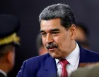 FILE PHOTO: Venezuela's President Nicolas Maduro prepares to leave at the end of a press conference, days after he said Venezuela would deploy military, police and civilian defenses at 284 "battlefront" locations across the country, amid heightened tensions with the U.S., in Caracas, Venezuela, September 15, 2025. REUTERS/Leonardo Fernandez Viloria/File Photo/Leonardo Fernandez Viloria