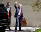 FILE PHOTO: Former White House national security adviser John Bolton arrives at his house following its search by the FBI in Bethesda, Maryland, U.S., August 22, 2025. REUTERS/Tasos Katopodis/File Photo/Tasos Katopodis