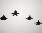 FILE PHOTO: Two F-16 and two F-35 fighter jets return to air base Flyvestation Skrydstrup after patrolling around Denmark at low altitude, as the Danish air base officially receives four F-35 fighter jets on October 1, 2023. Ritzau Scanpix/Bo Amstrup via REUTERS ATTENTION EDITORS - THIS IMAGE WAS PROVIDED BY A THIRD PARTY. DENMARK OUT. NO COMMERCIAL OR EDITORIAL SALES IN DENMARK./File Photo/Ritzau Scanpix