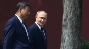 FILE PHOTO: Chinese President Xi Jinping and Russian President Vladimir Putin walk at the personal residence of the Chinese leader Zhongnanhai in Beijing, China September 2, 2025. Sputnik/Alexander Kazakov/Pool via REUTERS ATTENTION EDITORS - THIS IMAGE WAS PROVIDED BY A THIRD PARTY./File Photo/Alexander Kazakov