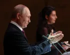Russian President Vladimir Putin attends the 20th anniversary celebration of the Russian state TV network RT (formerly Russia Today) at the Bolshoi Theatre in Moscow, Russia October 17, 2025. Sputnik/Vyacheslav Prokofyev/Pool via REUTERS ATTENTION EDITORS - THIS IMAGE WAS PROVIDED BY A THIRD PARTY./Vyacheslav Prokofyev