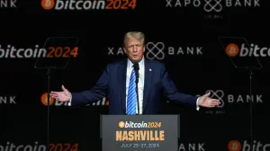FILE PHOTO: Republican presidential nominee and former U.S. President Donald Trump speaks at the Bitcoin 2024 event in Nashville, Tennessee, U.S., July 27, 2024. REUTERS/Kevin Wurm/File Photo/Kevin Wurm