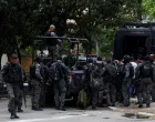 Members of the military police special unit gather to detain suspected drug dealers during a police operation against drug trafficking at the favela do Penha, in Rio de Janeiro, Brazil October 28, 2025. REUTERS/Aline Massuca/Aline Massuca