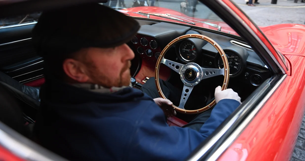 epa10367148 A 1969 Lamborghini Miura P400S Coupé is driven ahead of the Important Collectors' Motor Cars and Automobilia at Bonhams in London, Britain, 15 December 2022. The auction takes place on 16 December 2022. EPA/NEIL HALL/Neil Hall