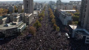 A drone view shows people gathering outside Novi Sad railway station during a commemorative service, on the first anniversary of the fatal November 2024 canopy collapse of the station, which killed 16 people, triggering nationwide accusations of widespread corruption and negligence, in Novi Sad, Serbia, November 1, 2025. REUTERS/Marko Djurica/Marko Djurica