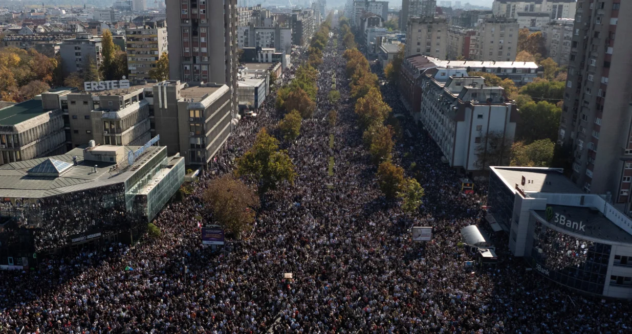 A drone view shows people gathering outside Novi Sad railway station during a commemorative service, on the first anniversary of the fatal November 2024 canopy collapse of the station, which killed 16 people, triggering nationwide accusations of widespread corruption and negligence, in Novi Sad, Serbia, November 1, 2025. REUTERS/Marko Djurica/Marko Djurica