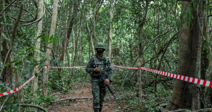 FILE PHOTO: Person from Thai military walks near Thai-Cambodian border at Chong Chub Ta Mok area, where landmines were found deployed, following a ceasefire between Cambodia and Thailand, in Surin Province, Thailand, August 20, 2025. REUTERS/Chalinee Thirasupa/File Photo/Chalinee Thirasupa