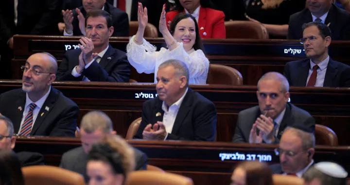 JERUSALEM - OCTOBER 13: Members of the Knesset applaud as U.S. President Donald Trump addresses the Knesset, Israel's parliament, on October 13, 2025 in Jerusalem. Chip Somodevilla/Pool via REUTERS/Chip Somodevilla