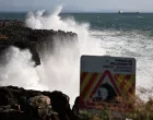 LISBON, PORTUGAL - NOVEMBER 15: Waves break along the coast of Lisbon as the ocean is agitated by wind and waves at during depression "Claudia" on November 15, 2025 in Cascias, Portugal. Roads blocked, trains stopped, and some districts being on high alert in the country due to meteorological conditions caused by depression "Claudia". Meteorologists predict that the bad weather will continue over the next few days in continental Portugal. (Zed Jameson - Anadolu Agency)/