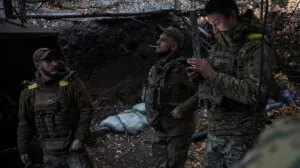 Artillerymen of the 15th 'Kara-Dag' Brigade of the Operational Assignment of the National Guard of Ukraine stand at a position, amid Russia's attack on Ukraine, near the frontline town of Kupiansk in Kharkiv region, Ukraine October 17, 2025. REUTERS/Anatolii Stepanov/Anatolii Stepanov