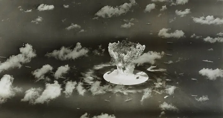 FILE PHOTO: A mushroom cloud rises with ships below during Operation Crossroads nuclear weapons test on Bikini Atoll, Marshall Islands in this 1946 handout provided by the U.S. Library of Congress. The United States said on April 25, 2014, it was examining lawsuits filed by the Marshall Islands against it and eight other nuclear-armed countries that accuse them of failing in their obligation to negotiate nuclear disarmament. REUTERS/U.S. Library of Congress/Handout via Reuters (MARSHALL ISLANDS - Tags: POLITICS MILITARY CONFLICT) ATTENTION EDITORS - FOR EDITORIAL USE ONLY. NOT FOR SALE FOR MARKETING OR ADVERTISING CAMPAIGNS. THIS PICTURE WAS PROVIDED BY A THIRD PARTY. REUTERS IS UNABLE TO INDEPENDENTLY VERIFY THE AUTHENTICITY, CONTENT, LOCATION OR DATE OF THIS IMAGE. THIS PICTURE IS DISTRIBUTED EXACTLY AS RECEIVED BY REUTERS, AS A SERVICE TO CLIENTS/File Photo/Handout.