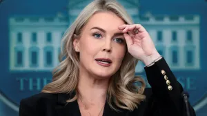White House Press Secretary Karoline Leavitt fixes her hair as she speaks during a press briefing at the White House in Washington, D.C., U.S., November 20, 2025. REUTERS/Evelyn Hockstein/Evelyn Hockstein