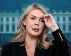 White House Press Secretary Karoline Leavitt fixes her hair as she speaks during a press briefing at the White House in Washington, D.C., U.S., November 20, 2025. REUTERS/Evelyn Hockstein/Evelyn Hockstein