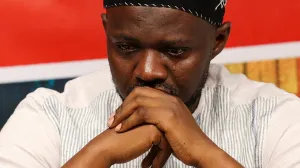 Africans Rising Co-ordinator Hardi Yakubu reacts as he attends a press conference, where they asked for negotiations to stop the war in Sudan, in Nairobi Kenya, December 1, 2025. REUTERS/Monicah Mwangi/Monicah Mwangi