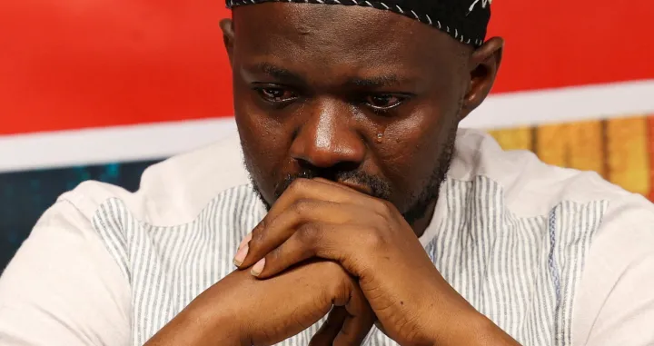 Africans Rising Co-ordinator Hardi Yakubu reacts as he attends a press conference, where they asked for negotiations to stop the war in Sudan, in Nairobi Kenya, December 1, 2025. REUTERS/Monicah Mwangi/Monicah Mwangi