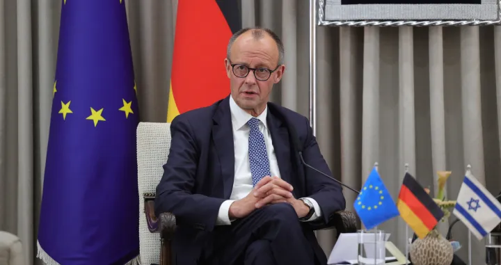German Chancellor Friedrich Merz looks on during a meeting with Israeli President Isaac Herzog at the President's residence in Jerusalem, December 6, 2025. Abir Sultan/Pool via REUTERS/Abir Sultan