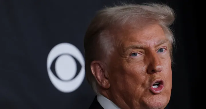 U.S. President Donald Trump poses on the red carpet for the 2025 Kennedy Center Honors at the John F. Kennedy Center for the Performing Arts in Washington, D.C., U.S., December 7, 2025. REUTERS/Jeenah Moon/Jeenah Moon