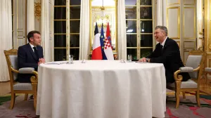 French President Emmanuel Macron and Croatia's Prime Minister Andrej Plenkovic hold a bilateral meeting at Elysee Palace in Paris, France, December 8, 2025. REUTERS/Gonzalo Fuentes/Pool  TPX IMAGES OF THE DAY/Gonzalo Fuentes