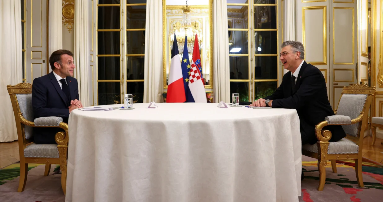 French President Emmanuel Macron and Croatia's Prime Minister Andrej Plenkovic hold a bilateral meeting at Elysee Palace in Paris, France, December 8, 2025. REUTERS/Gonzalo Fuentes/Pool  TPX IMAGES OF THE DAY/Gonzalo Fuentes