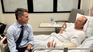 New South Wales Premier Chris Minns visits Ahmed al Ahmed, who was identified on social media as the bystander who hid behind parked cars and seized a rifle from one of the gunmen during the deadly shooting at Bondi Beach on Sunday, at a hospital in Sydney, Australia, December 15, 2025, in this picture obtained from social media. @ChrisMinnsMP via X/via REUTERS THIS IMAGE HAS BEEN SUPPLIED BY A THIRD PARTY. MANDATORY CREDIT. NO RESALES. NO ARCHIVES.  TPX IMAGES OF THE DAY/@chrisminnsmp Via X