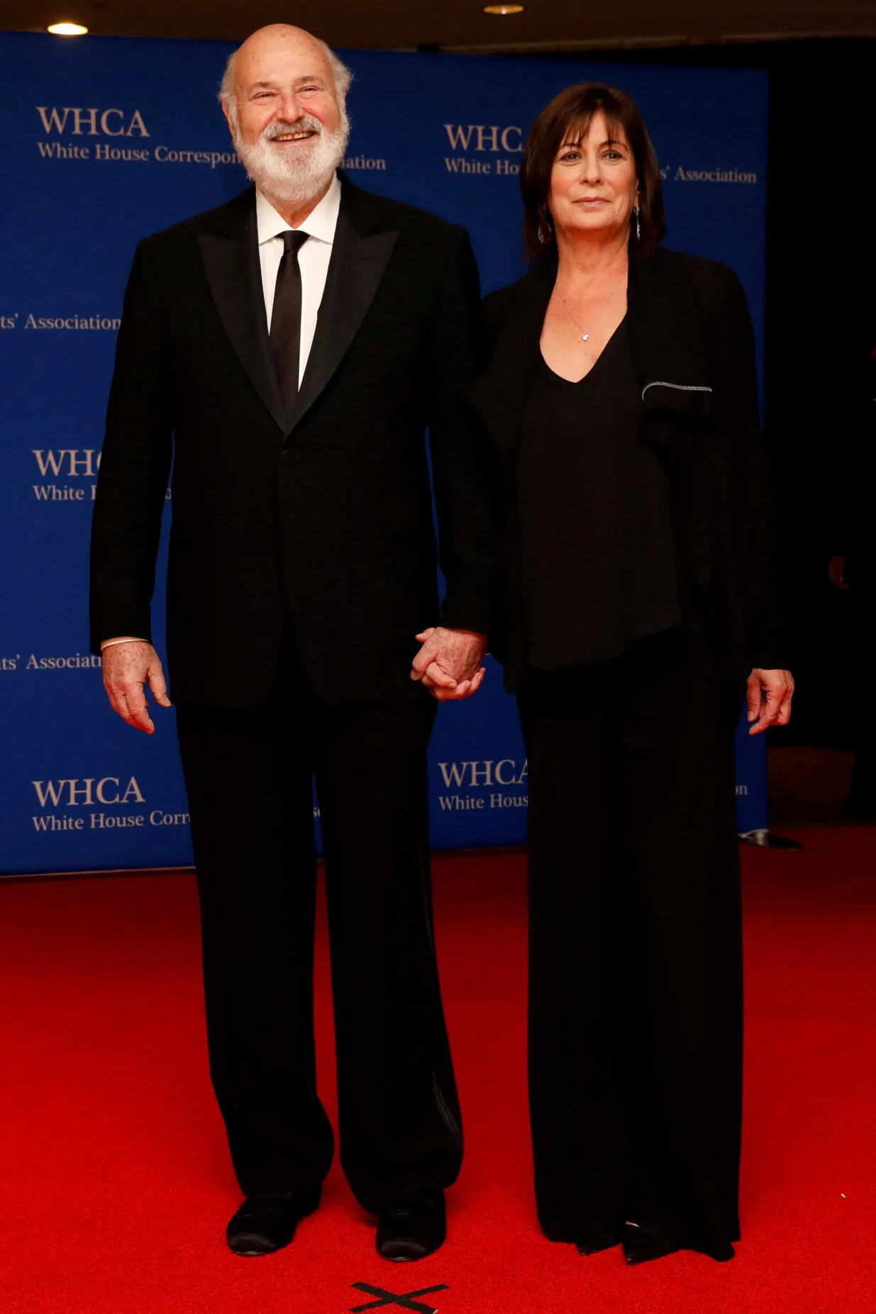 FILE PHOTO: Actor Rob Reiner and his wife Michele arrive on the red carpet at the White House Correspondents' Association dinner in Washington, U.S., April 28, 2018. REUTERS/Aaron P. Bernstein/File Photo/Aaron P. Bernstein