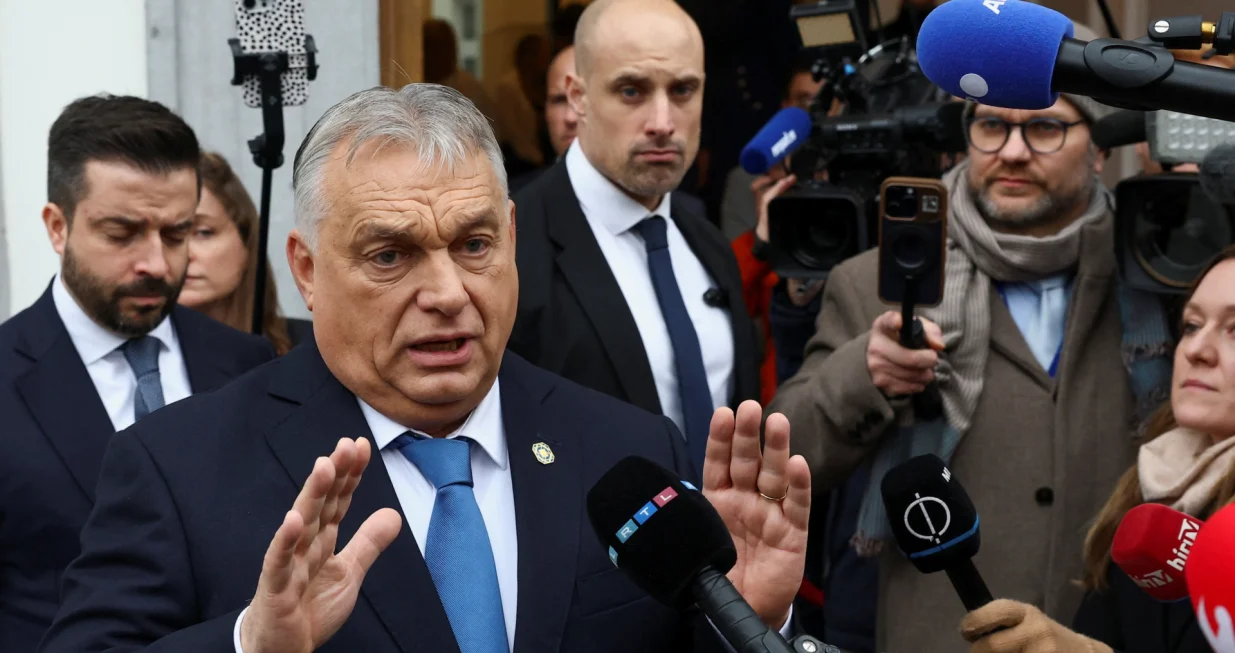 Hungarian Prime Minister Viktor Orban speaks to the media as he arrives at the Patriots for Europe (PfE) party meeting in Brussels, Belgium, December 17, 2025. REUTERS/Yves Herman/Yves Herman