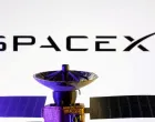 FILE PHOTO: SpaceX logo and miniature satellite model are seen in this illustration created on March 10, 2025. REUTERS/Dado Ruvic/Illustration/File Photo/File Photo/Dado Ruvic