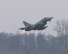 FILE PHOTO: German Air Force Eurofighter Typhoon fighter jet takes off during a training scramble at the 22nd Tactical Air Base in Malbork, Poland, December 10, 2025. REUTERS/Lukasz Glowala/File Photo/Lukasz Glowala