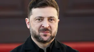 Ukrainian President Volodymyr Zelenskiy is welcomed by German President Frank-Walter Steinmeier (not pictured) at Bellevue Palace in Berlin, Germany, December 15, 2025. REUTERS/Liesa Johannssen/Liesa Johannssen