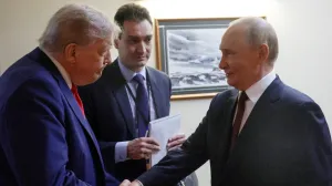 FILE PHOTO: U.S. President Donald Trump shakes hands with Russian President Vladimir Putin before a joint news conference following their meeting at Joint Base Elmendorf-Richardson in Anchorage, Alaska, U.S., August 15, 2025. Sputnik/Gavriil Grigorov/Pool via REUTERS ATTENTION EDITORS - THIS IMAGE WAS PROVIDED BY A THIRD PARTY./File Photo/Gavriil Grigorov