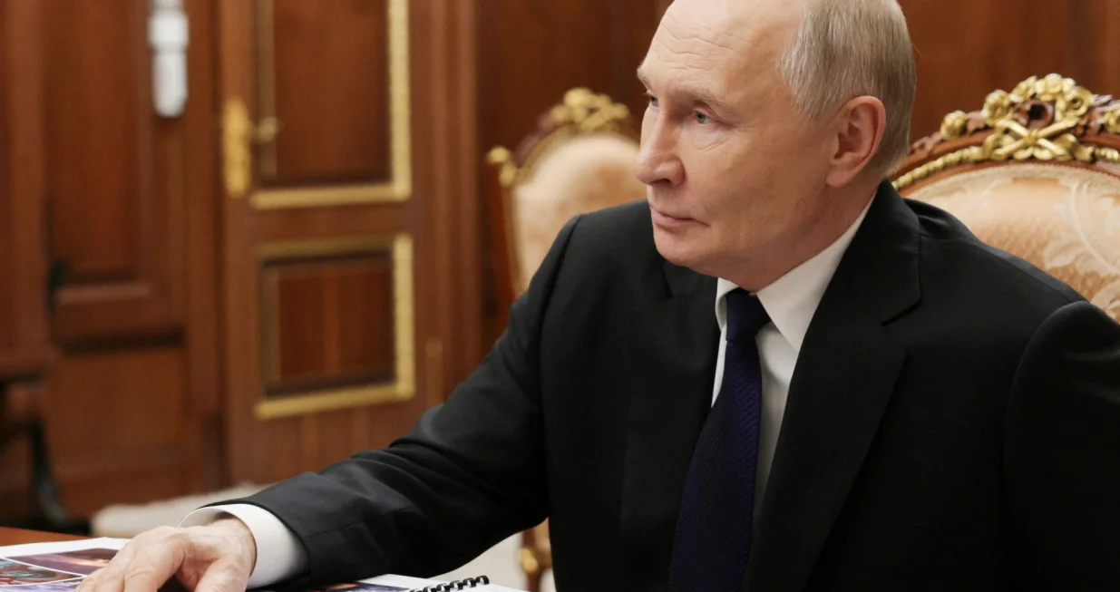 Russia's President Vladimir Putin attends a meeting with Deputy Minister of Defence and Chair of Defenders of the Fatherland Foundation Anna Tsivileva in Moscow, Russia, December 30, 2025. Sputnik/Mikhail Metzel/Pool via REUTERS ATTENTION EDITORS - THIS IMAGE WAS PROVIDED BY A THIRD PARTY./Mikhail Metzel