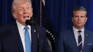 U.S. President Donald Trump speaks as Secretary of Defense Pete Hegseth looks at him during a press conference following a U.S. strike on Venezuela where President Nicolas Maduro and his wife, Cilia Flores, were captured, from Trump's Mar-a-Lago club in Palm Beach, Florida, U.S., January 3, 2026. REUTERS/Jonathan Ernst/Jonathan Ernst