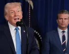 U.S. President Donald Trump speaks as Secretary of Defense Pete Hegseth looks at him during a press conference following a U.S. strike on Venezuela where President Nicolas Maduro and his wife, Cilia Flores, were captured, from Trump's Mar-a-Lago club in Palm Beach, Florida, U.S., January 3, 2026. REUTERS/Jonathan Ernst/Jonathan Ernst