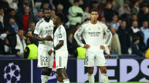 Soccer Football - UEFA Champions League - Real Madrid v Manchester City - Santiago Bernabeu, Madrid, Spain - December 10, 2025 Real Madrid's Antonio Rudiger, Vinicius Junior and Jude Bellingham react after the match REUTERS/Susana Vera/Foto: Susana Vera