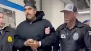 A still image from video posted by the White House's Rapid Response 47 account on X.com, which originated from the @PaulDMauro account, shows Venezuela's President Nicolas Maduro being walked in custody down a hallway at the offices of the U.S. Drug Enforcement Administration (DEA) in New York City, U.S., January 3, 2026. @RapidResponse47/Handout via REUTERS THIS IMAGE HAS BEEN SUPPLIED BY A THIRD PARTY. MANDATORY CREDIT.NO RESALES. NO ARCHIVES Verification - Reuters was able to confirm footage of Nicolas Maduro walking through the halls of DEA headquarters in New York as seen on corroborating footage showing same personnels ushering Maduro and DEA NYD crest on the wall. - Logo on wall matched DEA NYD from file images. - Reuters witness footage showing convoy arriving at DEA headquarters in Manhattan./@rapidresponse47