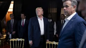 FILE PHOTO: A photograph posted by U.S. President Donald Trump on his Truth Social account shows him standing near CIA Director John Ratcliffe as they watch the U.S. military operation in Venezuela from Trump's Mar a Lago resort, in Palm Beach, Florida, U.S., January 3, 2026. @realDonaldTrump/Handout via REUTERS THIS IMAGE HAS BEEN SUPPLIED BY A THIRD PARTY./File Photo/@realdonaldtrump
