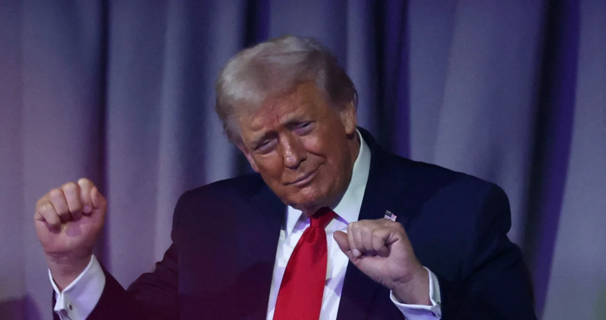 FILE PHOTO: Soccer Football - FIFA World Cup 2026 - FIFA World Cup 2026 Draw - John F. Kennedy Center for the Performing Arts, Washington, D.C., U.S. - December 5, 2025 U.S. President Donald Trump dances as Village People perform during the FIFA World Cup 2026 draw Pool via REUTERS/Dan Mullan/File Photo/Dan Mullan