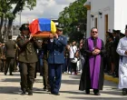 Military personnel carry a casket during the funeral of soldiers killed in a U.S. operation to capture Venezuela's leader Nicolas Maduro and his wife Cilia Flores in the capital on January 3, at a cemetery in Caracas, Venezuela, January 7, 2026. REUTERS/Maxwell Briceno/Maxwell Briceno