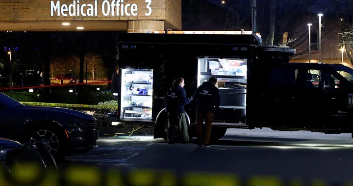 FBI agents work next to an evidence truck outside Adventist Hospital after U.S. federal agents shot two people in Portland, Oregon, U.S., January 8, 2026. REUTERS/John Rudoff/John Rudoff