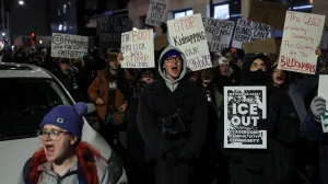 Demonstrators shout slogans during a demonstration against increased immigration enforcement, days after the fatal shooting of Renee Nicole Good by a U.S. Immigration and Customs Enforcement (ICE) agent, outside the Canopy by Hilton hotel that demonstrators believe is being used by federal agents, in Minneapolis, Minnesota, U.S., January 9, 2026. REUTERS/Tyrone Siu/Tyrone Siu