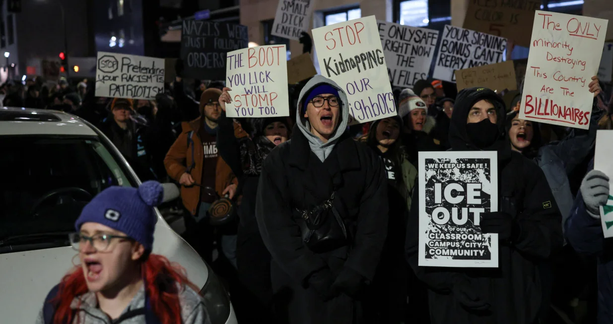 Demonstrators shout slogans during a demonstration against increased immigration enforcement, days after the fatal shooting of Renee Nicole Good by a U.S. Immigration and Customs Enforcement (ICE) agent, outside the Canopy by Hilton hotel that demonstrators believe is being used by federal agents, in Minneapolis, Minnesota, U.S., January 9, 2026. REUTERS/Tyrone Siu/Tyrone Siu