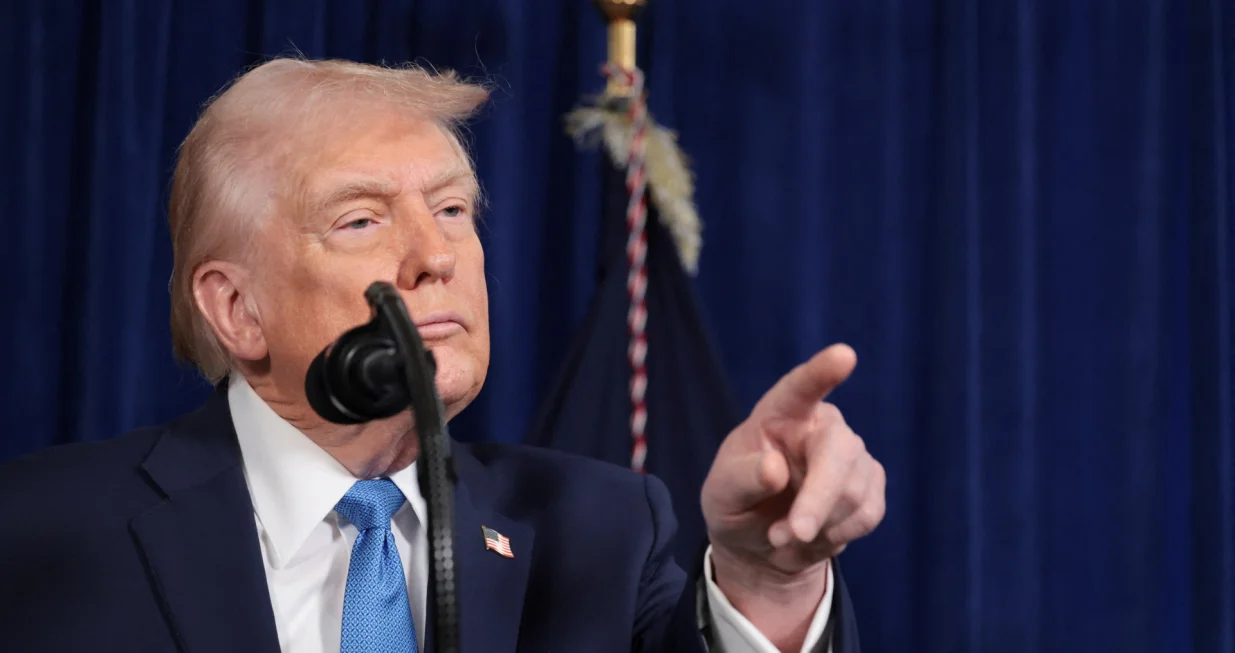 U.S. President Donald Trump points during a press conference following a U.S. strike on Venezuela where President Nicolas Maduro and his wife, Cilia Flores, were captured, from Trump's Mar-a-Lago club in Palm Beach, Florida, U.S., January 3, 2026. REUTERS/Jonathan Ernst/Jonathan Ernst