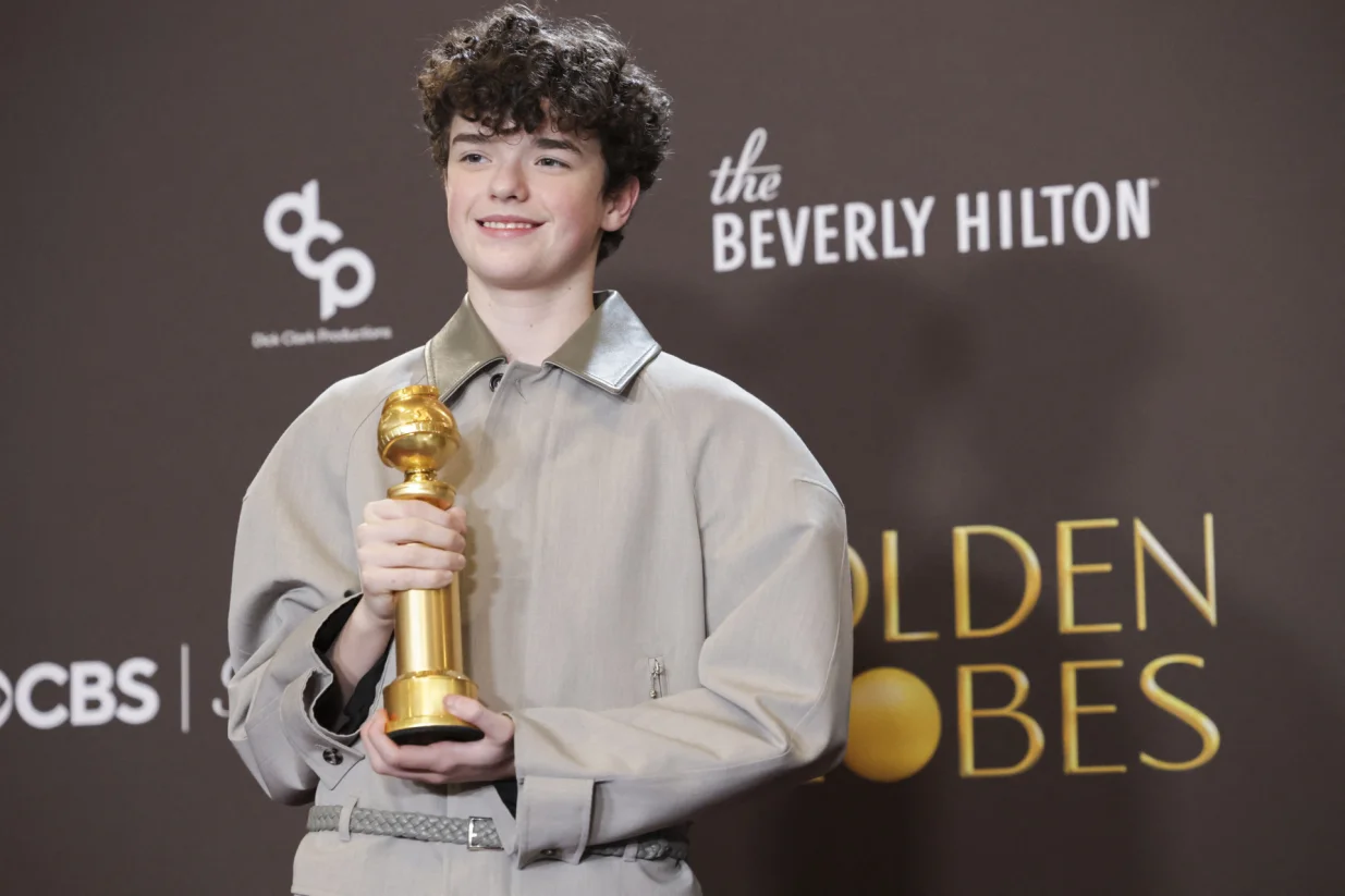 Owen Cooper poses with the Best Performance by a Male Actor in a Supporting Role on Television award for "Adolescence" at the 83rd Annual Golden Globes in Beverly Hills, California, U.S., January 11, 2026. REUTERS/Mario Anzuoni/Mario Anzuoni