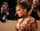 Jennifer Lopez poses on the red carpet at the 83rd Annual Golden Globes in Beverly Hills, California, U.S., January 11, 2026. REUTERS/Daniel Cole/Daniel Cole