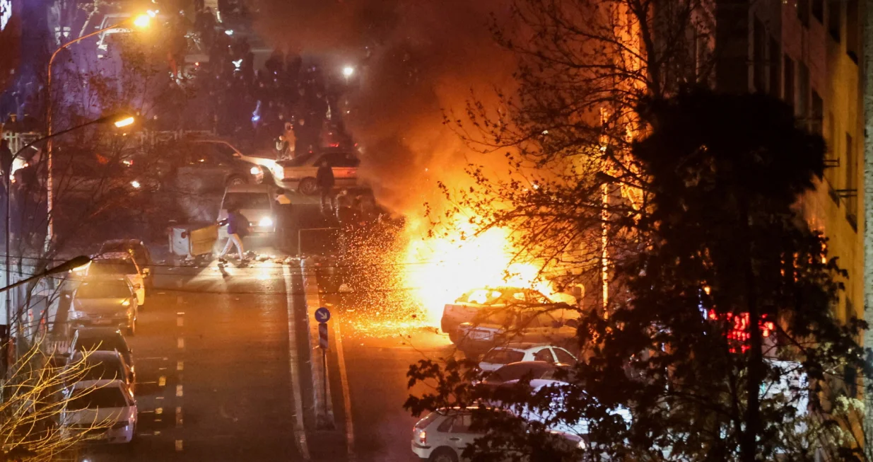 Cars burn in a street during a protest over the collapse of the currency's value, in Tehran, Iran, January 8, 2026. Stringer/WANA (West Asia News Agency) via REUTERS ATTENTION EDITORS - THIS PICTURE WAS PROVIDED BY A THIRD PARTY  TPX IMAGES OF THE DAY/Stringer