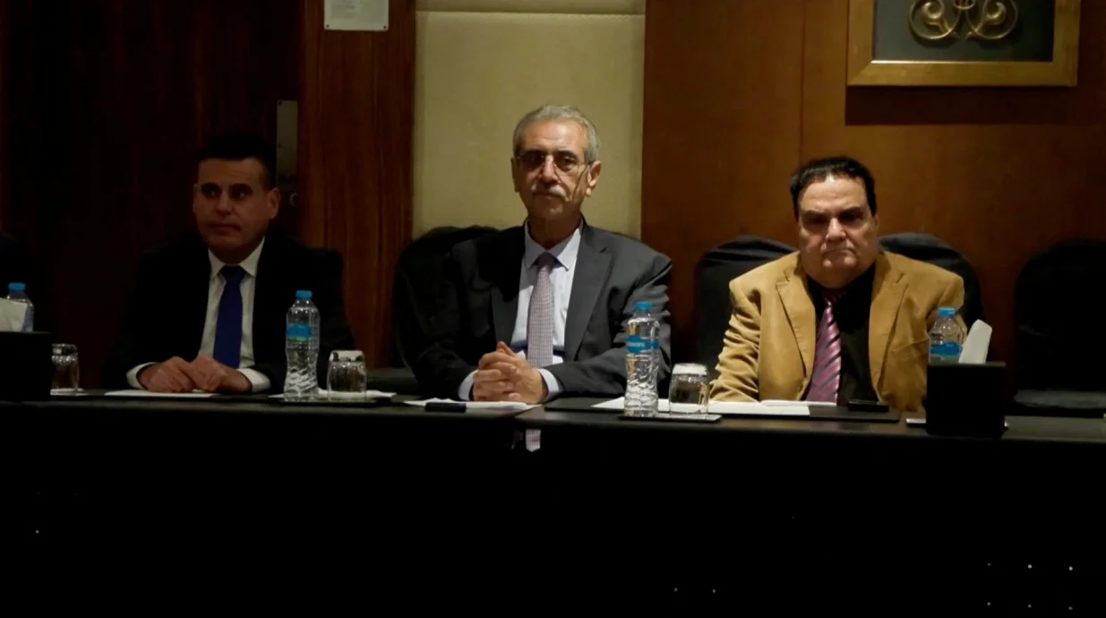 Ali Shaath, a former deputy minister in the Western-backed Palestinian Authority, who will lead the new Palestinian committee tasked with governing Gaza, attends a meeting along with other committee members, days after the U.S. launched the second phase of its plan to end the Gaza war, in Cairo, Egypt, January 16, 2026, in this screenshot from a handout video. Egyptian Press Centre/Handout via REUTERS THIS IMAGE HAS BEEN SUPPLIED BY A THIRD PARTY/Egyptian Press Centre