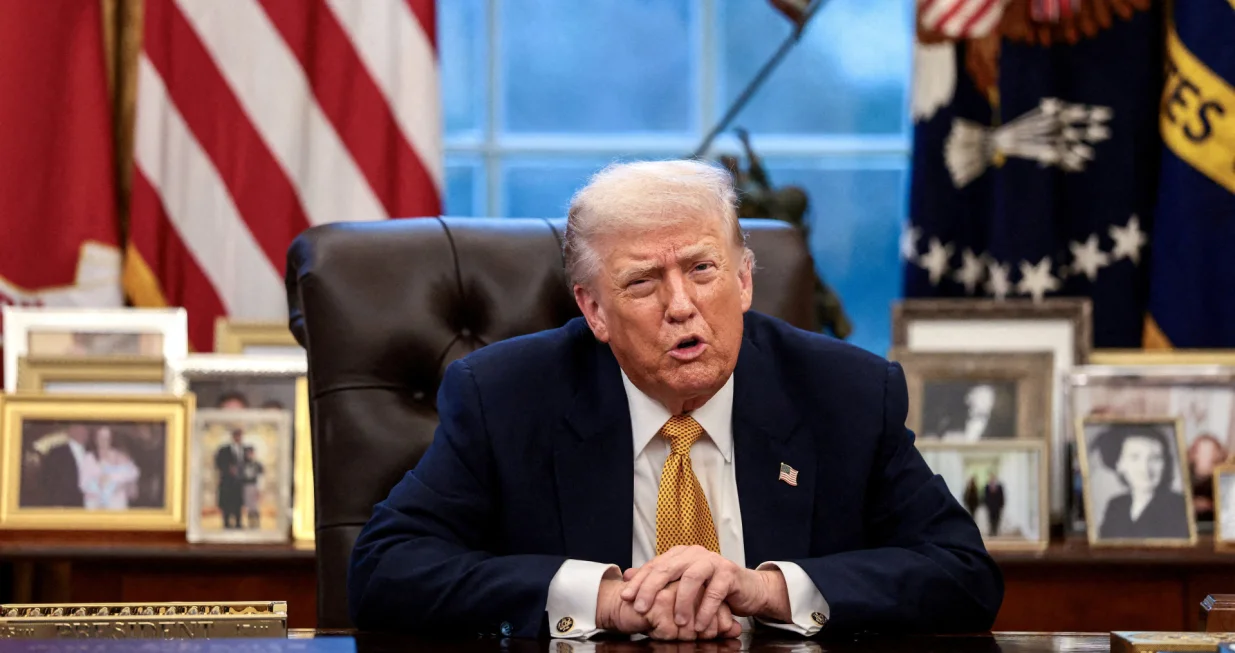 FILE PHOTO: U.S. President Donald Trump is interviewed by Reuters White House correspondent Steve Holland (not pictured) during an exclusive interview in the Oval Office in the White House in Washington, D.C., U.S., January 14, 2026. REUTERS/Evelyn Hockstein/File Photo/Evelyn Hockstein